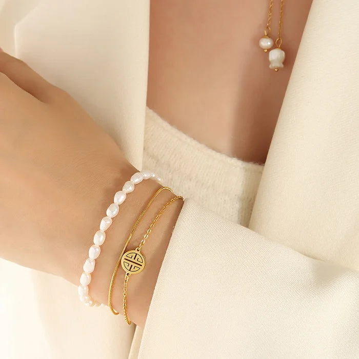 Dual Strand Pearl Emblem Bracelet